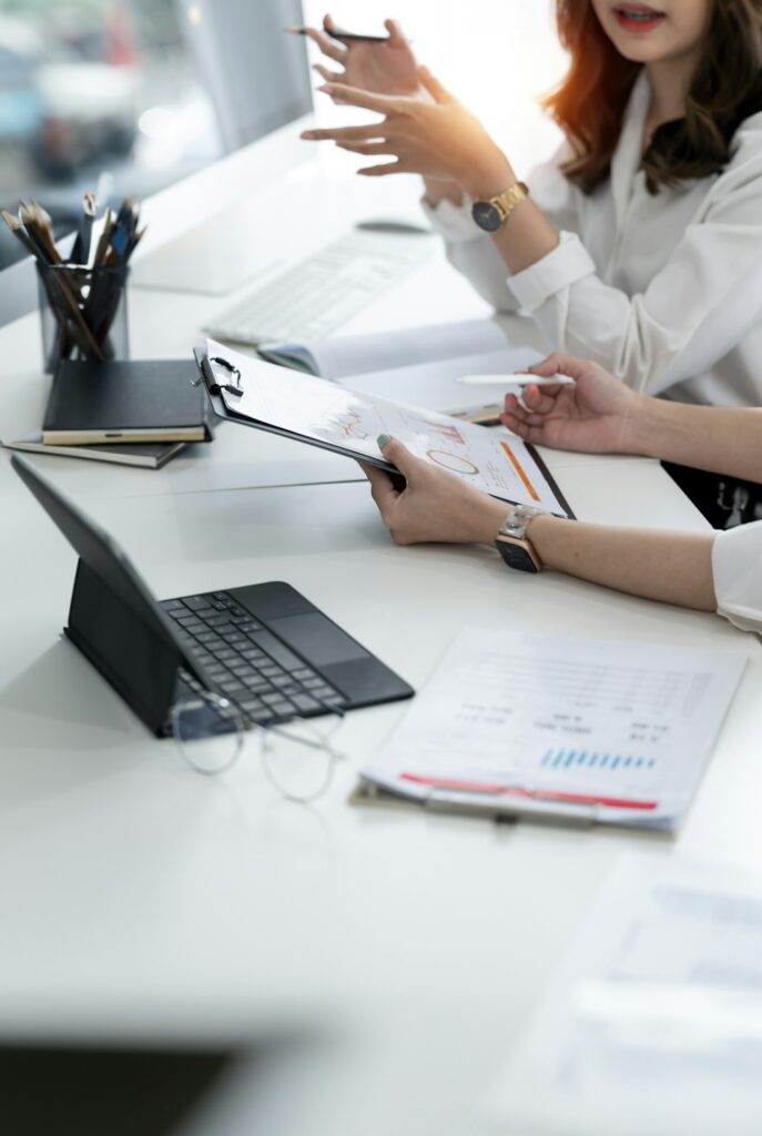 Business woman meeting at office discussing and planning strategy and brainstorming.